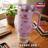Premium Peanuts Snoopy Purple 40oz Stanley Tumbler featuring gold character line art, purple lid, and ergonomic handle.