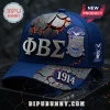 Premium Phi Beta Sigma Fraternity Cap in blue with 3D cracked stone texture, silver Greek letters, and metal emblem.