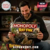 Rat Fink Collector Edition Monopoly Board Game box held by a man wearing a matching graphic hoodie in a garage setting.
