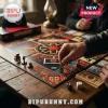 Red Hot Chili Peppers Collector Edition Monopoly Board Game featuring custom guitar tokens on a dark wooden tabletop.