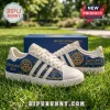 Rotary International blue gold casual shoes featuring a Service Above Self emblem and logo on a white leather base.