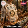 Rotary International Service Above Self beige ugly sweater with a gear logo, forest graphics, and fall leaf patterns.