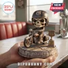 Route 66 100th Anniversary Skeleton Motorcyclist Vinyl Figure with a miniature bike on a themed display base held in hands.