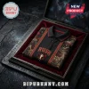 Rush 2112 Starman Black Polo Shirt featuring iconic album art, red star logo, and detailed space graphics in a velvet box.
