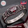 Rush Band Closer To The Heart bracelet featuring a black center, red stone, owl motifs, and engraved interior text.