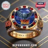 Rush Rock Band Gemstone Ring featuring a blue center stone, an owl emblem, red side stones, and gold band engraving.
