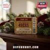 San Francisco 49ers Faithful To The Bay ornament shaped like a vintage ticket stub with gold trim and red lettering.