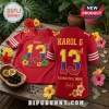 San Francisco 49ers Karol G Floral Red Football Jersey featuring number 13, yellow flower accents, and Colombian flag colors.