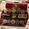 San Francisco 49ers Professional 300-Piece Poker Set featuring branded chips, playing cards, and a mat in a metal case.