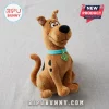 Scooby Doo Brown Plush Toy with a cyan collar and SD tag sitting on a neutral grey textured fabric background.