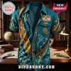 Scooby-Doo Mystery Blue Hawaiian Shirt featuring Mystery Inc. branding, ghost patterns, and stars on a teal fabric base.