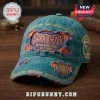 Scooby-Doo Mystery Distressed Baseball Cap 2026 in teal denim with embroidered patches, frayed edges, and metal pin logo.