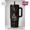 Scream Horror Movie Halloween Stanley Tumbler featuring Ghostface, a scared woman, roses, and skulls on a black cup.