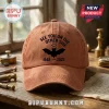 See You On The Other Side Bat 1948-2025 Baseball Cap in rust orange with black bat graphic and angel halo design.