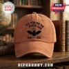 See You On The Other Side Bat 1948-2025 Baseball Cap in rustic brown featuring a black winged bat graphic and a halo icon.