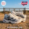 Skechers Dallas Cowboys D'Lites Mascot Chunky Sneakers in white featuring team branding and mascot graphics on a desert floor.