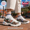 Skechers Florida Gators D'Lites White Sneakers with orange and blue mascot and stadium graphics on white leather exterior.