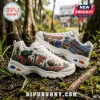 Skechers Florida Gators D'Lites White Sneakers with orange, blue, and palm tree graphics on a textured forest floor.