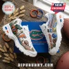 Skechers Florida Gators D'Lites white sneakers featuring orange and blue team graphics on a wooden table with a logo box.