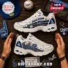 Skechers Los Angeles Dodgers D'Lites White Sneakers featuring blue Dodger Stadium graphics and team logos on wooden table.