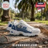 Skechers Los Angeles Dodgers D'Lites white sneakers featuring blue team logos, baseball graphics, and Bleed Blue text.