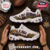 Skechers LSU Tigers D'Lites White Athletic Sneakers featuring purple and gold graphics of Tiger Stadium and a tiger mascot.