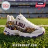 Skechers LSU Tigers D'Lites white athletic sneakers with tiger graphics, football imagery, and purple and gold accents.