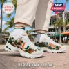Skechers Miami Hurricanes D'Lites white sneakers featuring an orange, green, and white mascot and tropical palm tree design.