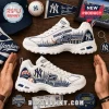 Skechers New York Yankees D'Lites White Platform Sneaker with Yankee Stadium graphics and team logos on wooden table.