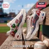 Skechers Philadelphia Phillies D'Lites Mascot Sneakers featuring team graphics, Philly mascot, and logos on white leather.