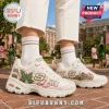 Skechers x Alpha Kappa Alpha Pearl Embroidered D Lites Sneaker featuring white leather, ivy leaf motifs, and pearl accents.