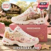 Skechers x Dolly Parton D'Lites White Platform Sneaker featuring Dollywood graphics, floral prints, and inspirational text.