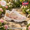 Skechers x Dolly Parton D'Lites White Platform Sneaker featuring a portrait, roses, butterflies, and motivational text.