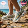 Skechers x Jimmy Buffett D'Lites White Tropical Sneakers featuring Margaritaville graphics on a beach background.