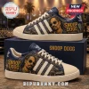 Snoop Dogg Fo Shizzle Embroidered Casual Shoes featuring navy blue uppers, gold portrait detailing, and white soles.