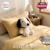 Snoopy Sherpa Fabric Character Plush Pillow featuring a white textured body, black ears, and a red collar on a yellow bed.