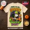 Snoopy x Pringles Halloween Spooky Snackin T-Shirt featuring Snoopy in a witch hat with Pringles cans on cream fabric.