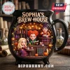 Sophia's Brew House Witch Sisters Ceramic Cauldron Mug featuring three illustrated witches inside a black cauldron shape.