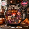 Sophia's Brew House Witch Sisters Ceramic Cauldron Mug featuring three witch characters, potion bottles, and fall decor.