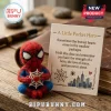 Spider-Man Handmade Felt Pocket Hug holding a white web near a card with an inspirational quote about strength.