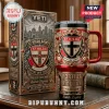 St Kilda Saints YETI Stanley Tumbler in red and black featuring team crests, ornate gold filigree, and matching display box.