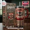 St Kilda Saints YETI Stanley Tumbler in red, black, and gold featuring team crest, city skyline, and Fortius Quo Fidelius text.