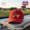 St. Louis Cardinals x Pokemon Pikachu baseball cap in red featuring Charmander and Pikachu mascots on a stadium bench.