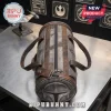 Star Wars Mandalorian Embossed Utility Duffle Bag featuring a silver helmet design on a brown and grey cylindrical body.