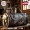 Star Wars Mandalorian Embossed Utility Duffle Bag with helmet detail, dark brown synthetic leather, and industrial accents.