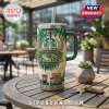Starbucks 55th Anniversary YETI Stanley Tumbler with green tie-dye pattern, logo, coffee icons, and a clear plastic straw.