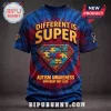 Superman Autism Awareness shirt featuring a puzzle piece chest emblem, tie-dye blue and red fabric, and bold text.