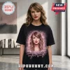 Taylor Swift Eras Tour Jam Black T-Shirt featuring a central portrait of the singer surrounded by purple cosmic clouds.