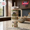 Teenage Mutant Ninja Turtles 40oz Handle Tumbler featuring graphic prints of the four turtles, pizza, and ooze on a cream base.