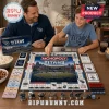 Tennessee Titans Collector Edition Monopoly Board Game featuring branded game pieces, money, and Nissan Stadium imagery.